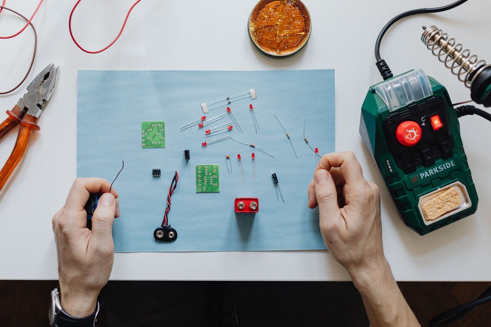 Close-up of maintenance and repair tools on an electronic circuit board